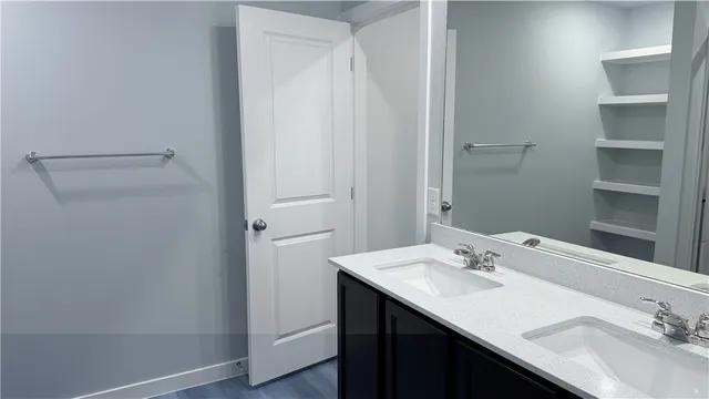 a bathroom with a shower and a toilet