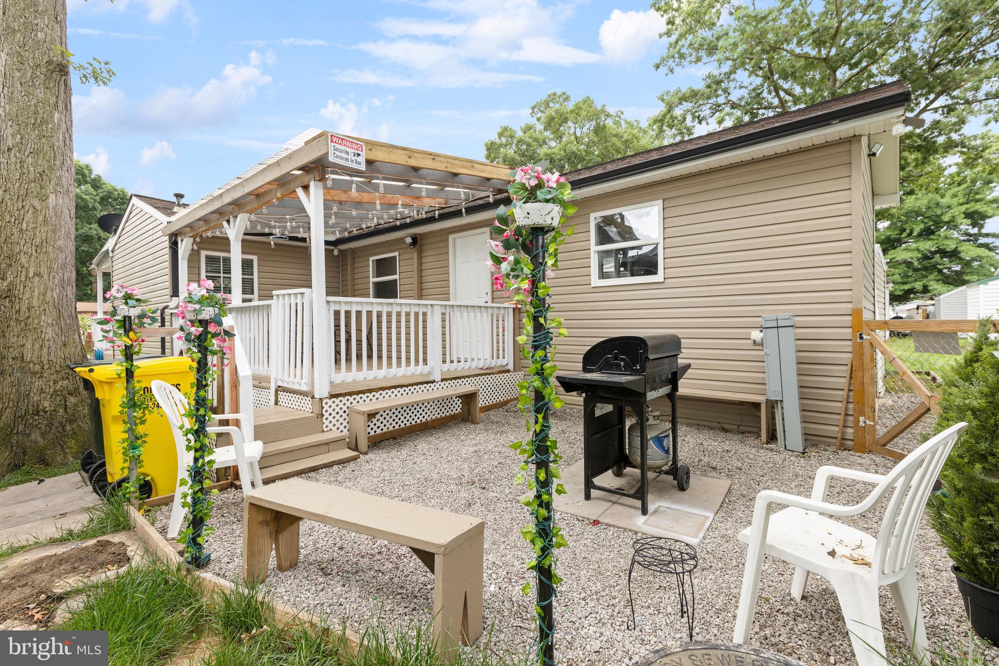 3512 Wagon Train Road Middle River, MD 21220 - Photo 23 of 27 a view of a house with backyard and sitting area
