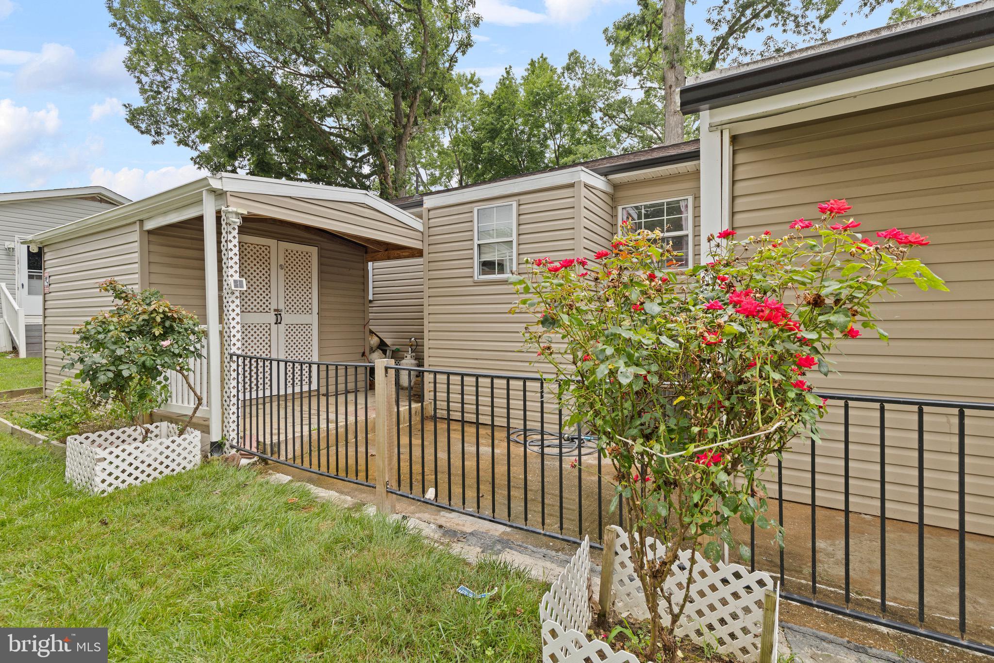 3512 Wagon Train Road Middle River, MD 21220 - Photo 26 of 27 a house view with a garden space