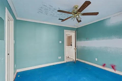 a bathroom with a sink toilet and a mirror
