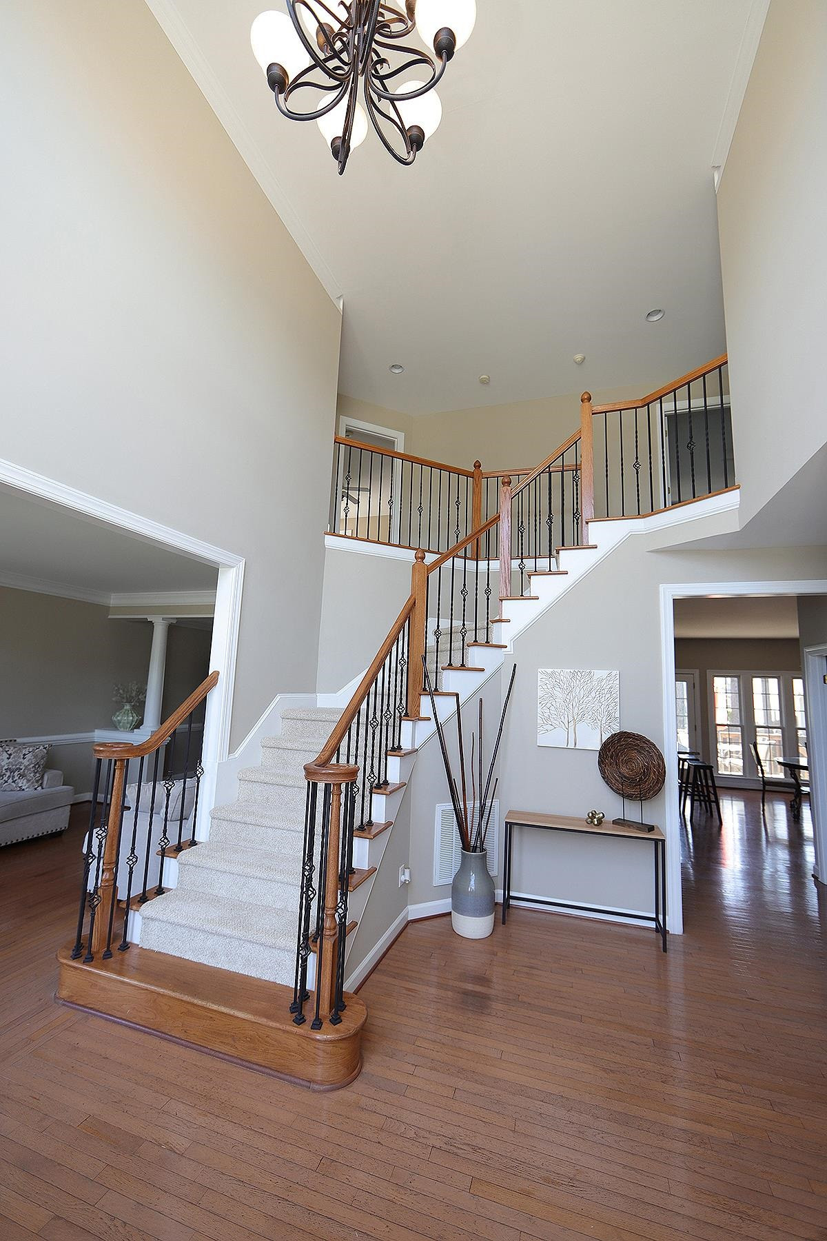 6017 Jones Farm Road Wake Forest, NC 27587 - Photo 2 of 25 The entry is flanked by a dramatic 2-story foyer and hardwoods meet you at the front door! The oversized foyer is welcoming to your many guests to entertain in this beauty! Foyer