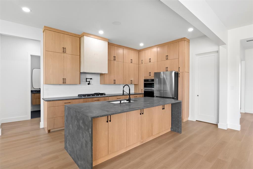 Tbd Hampel Road Palmer, TX 75152 - Photo 11 of 34 a kitchen with stainless steel appliances granite countertop a sink stove and refrigerator