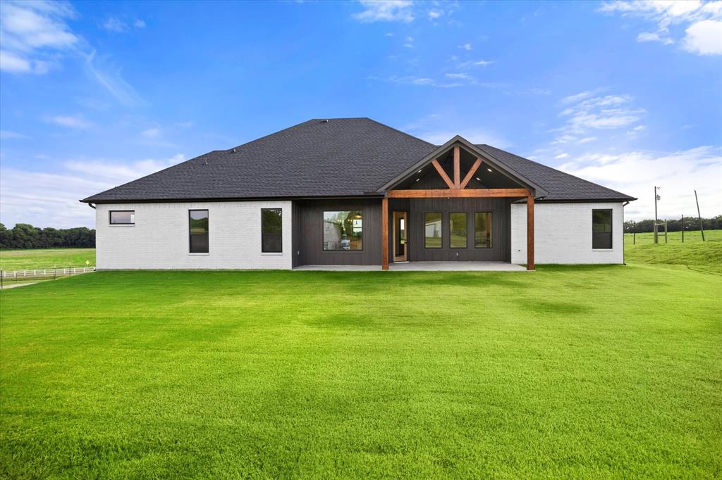 Tbd Hampel Road Palmer, TX 75152 - Photo 19 of 34 a front view of a house with a garden