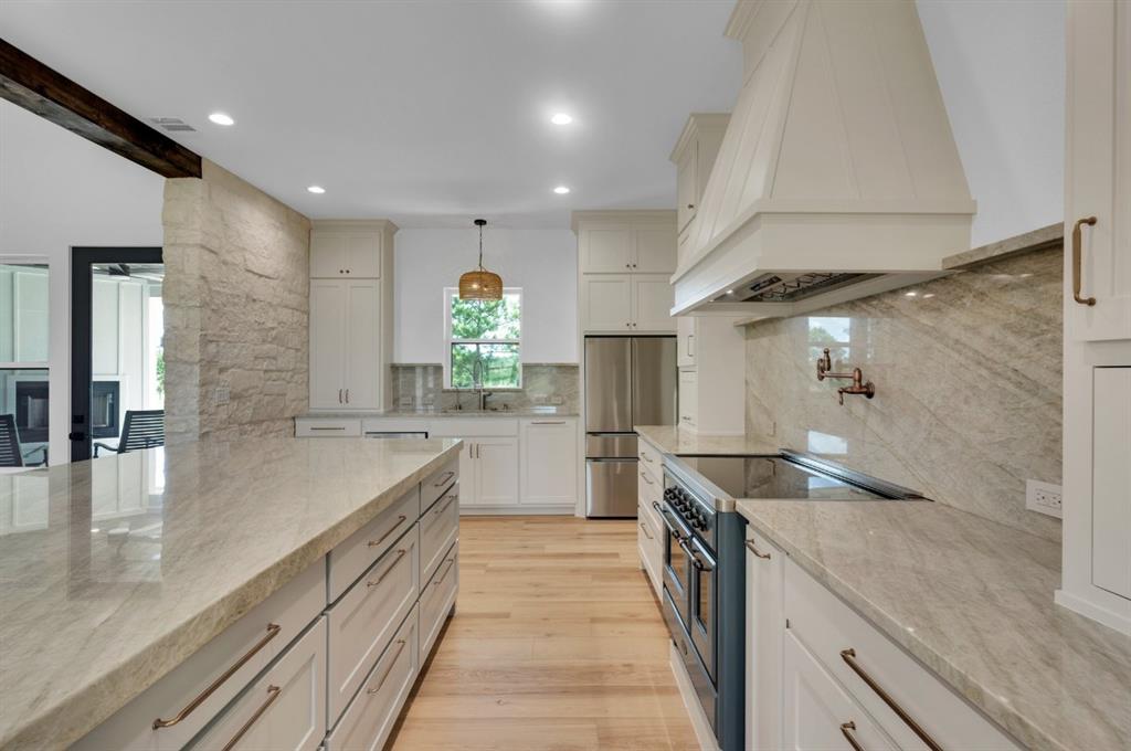 Tbd Hampel Road Palmer, TX 75152 - Photo 30 of 34 a kitchen with granite countertop a sink and stove