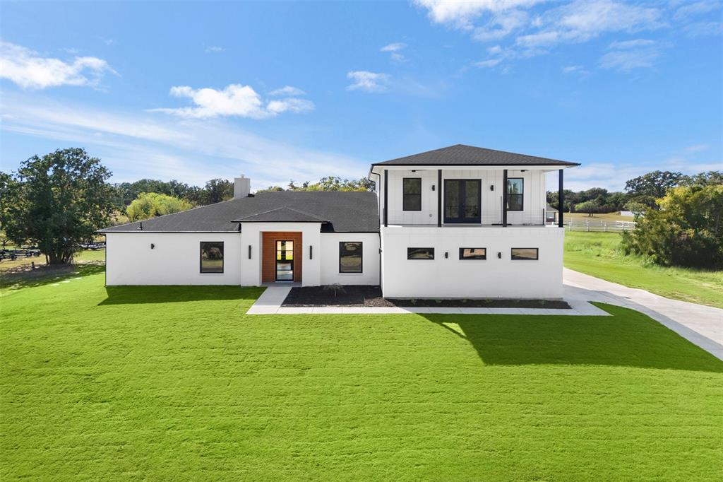 Tbd Hampel Road Palmer, TX 75152 - Photo 9 of 34 a front view of house with yard and seating area
