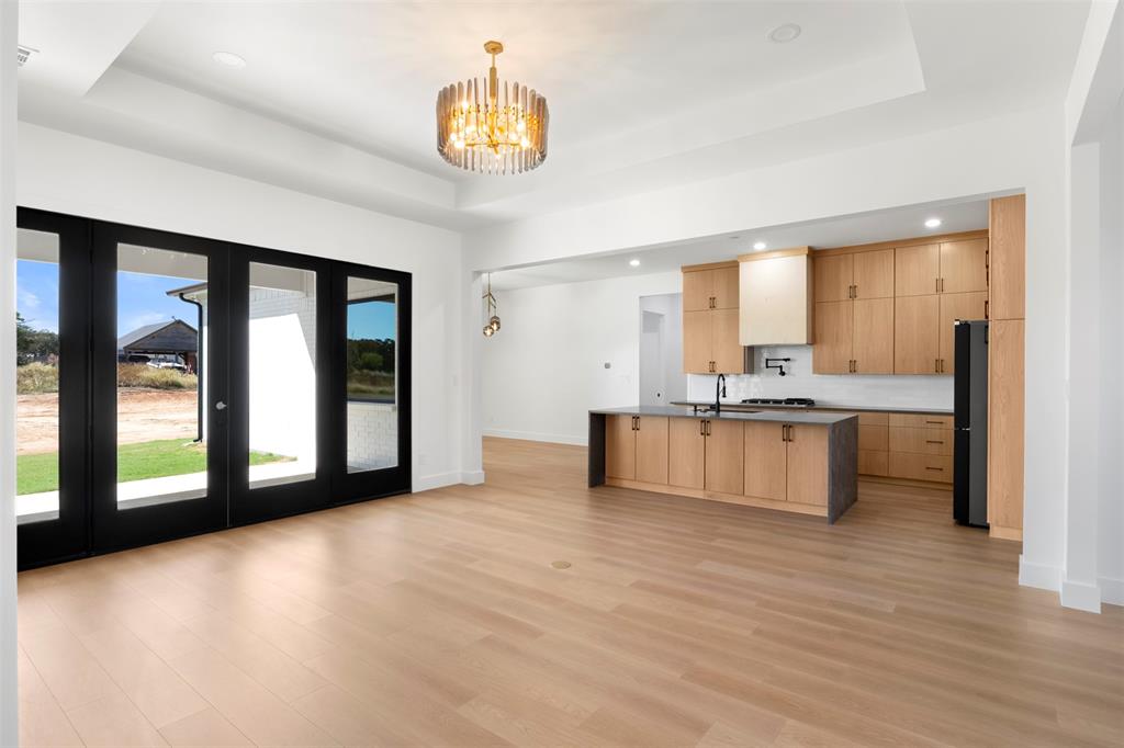 Tbd Hampel Road Palmer, TX 75152 - Photo 10 of 34 a large kitchen with a window and wooden floor