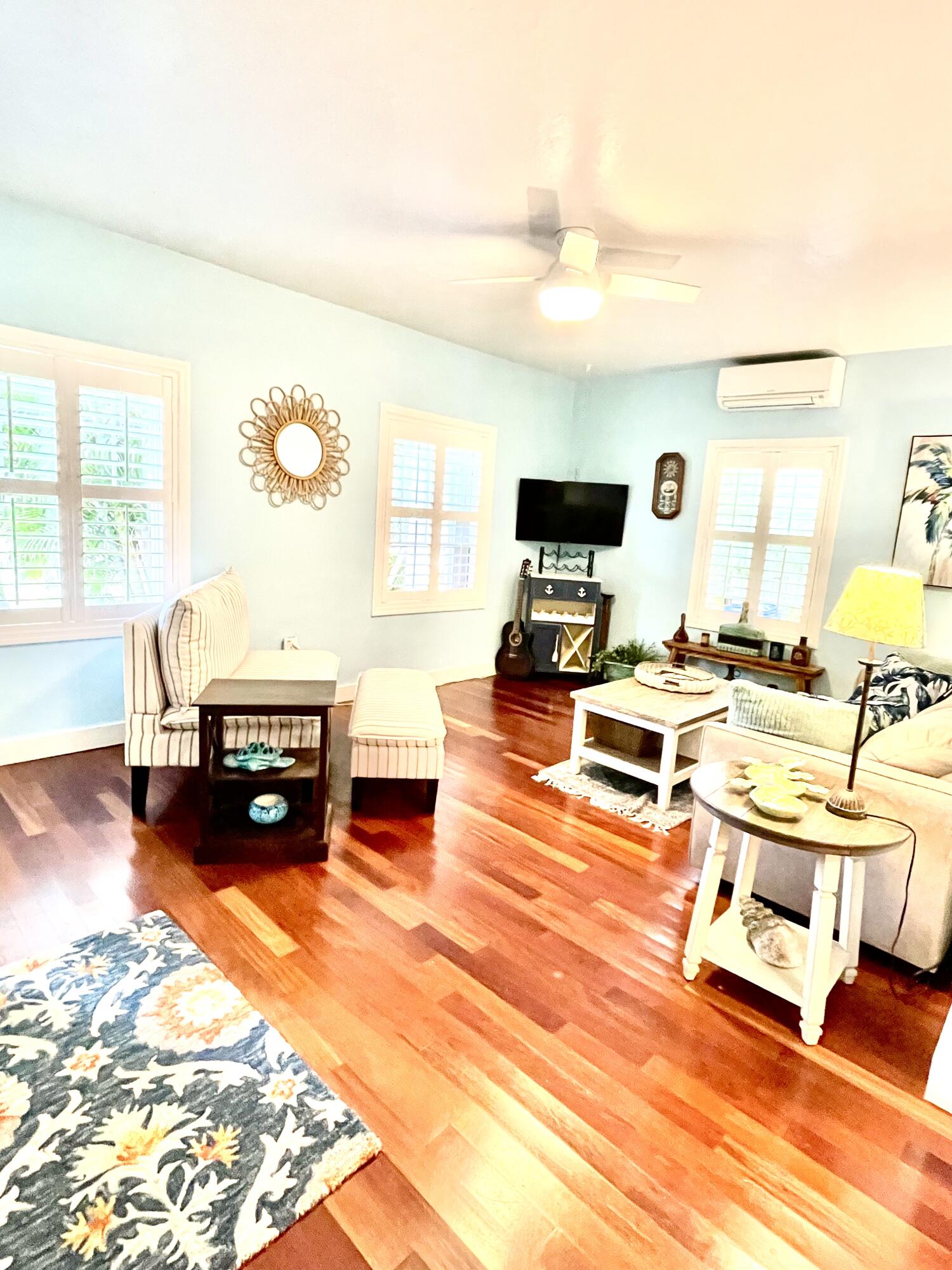 804 South Street, Unit 1 Key West, FL 33040 - Photo 11 of 31 a living room filled with furniture and a flat screen tv