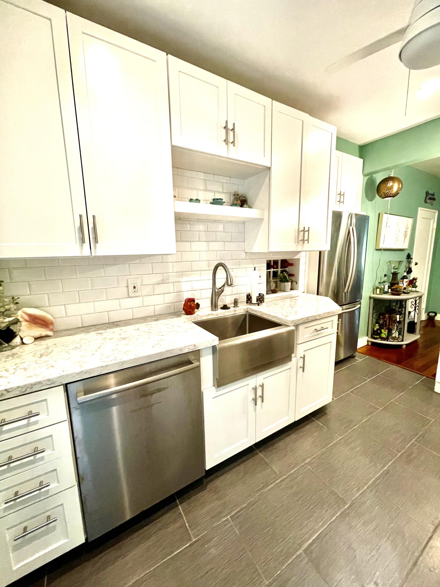 804 South Street, Unit 1 Key West, FL 33040 - Photo 15 of 31 a kitchen with stainless steel appliances a sink a stove and a window