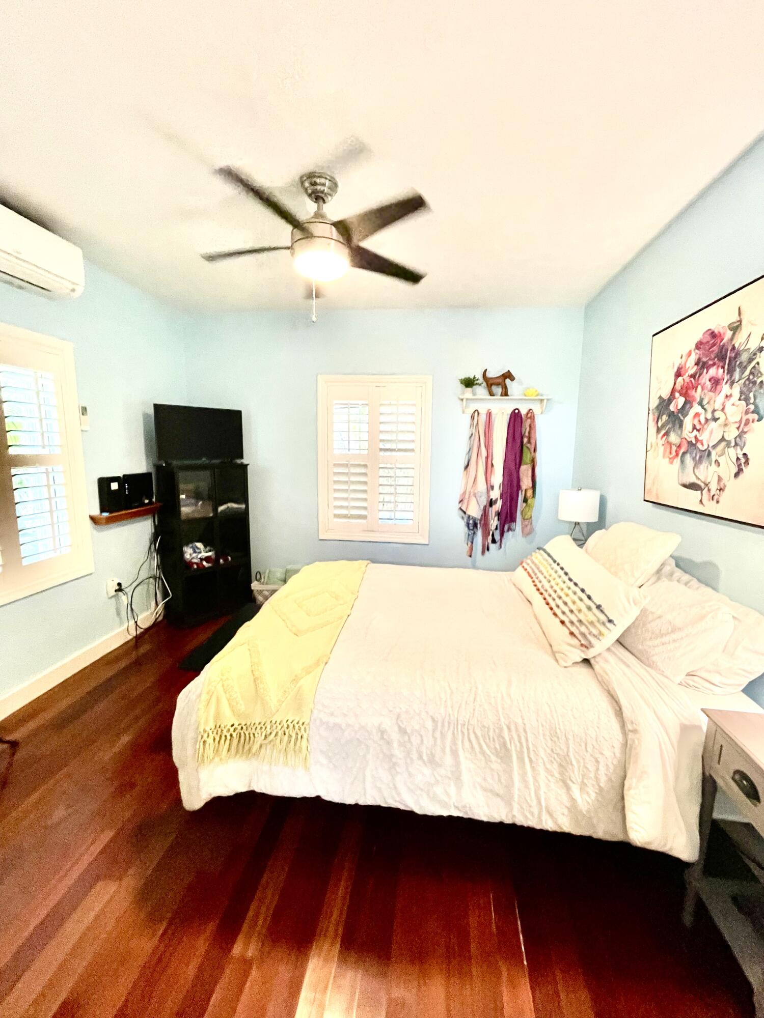 804 South Street, Unit 1 Key West, FL 33040 - Photo 24 of 31 a bed sitting in a bedroom and a flat screen tv