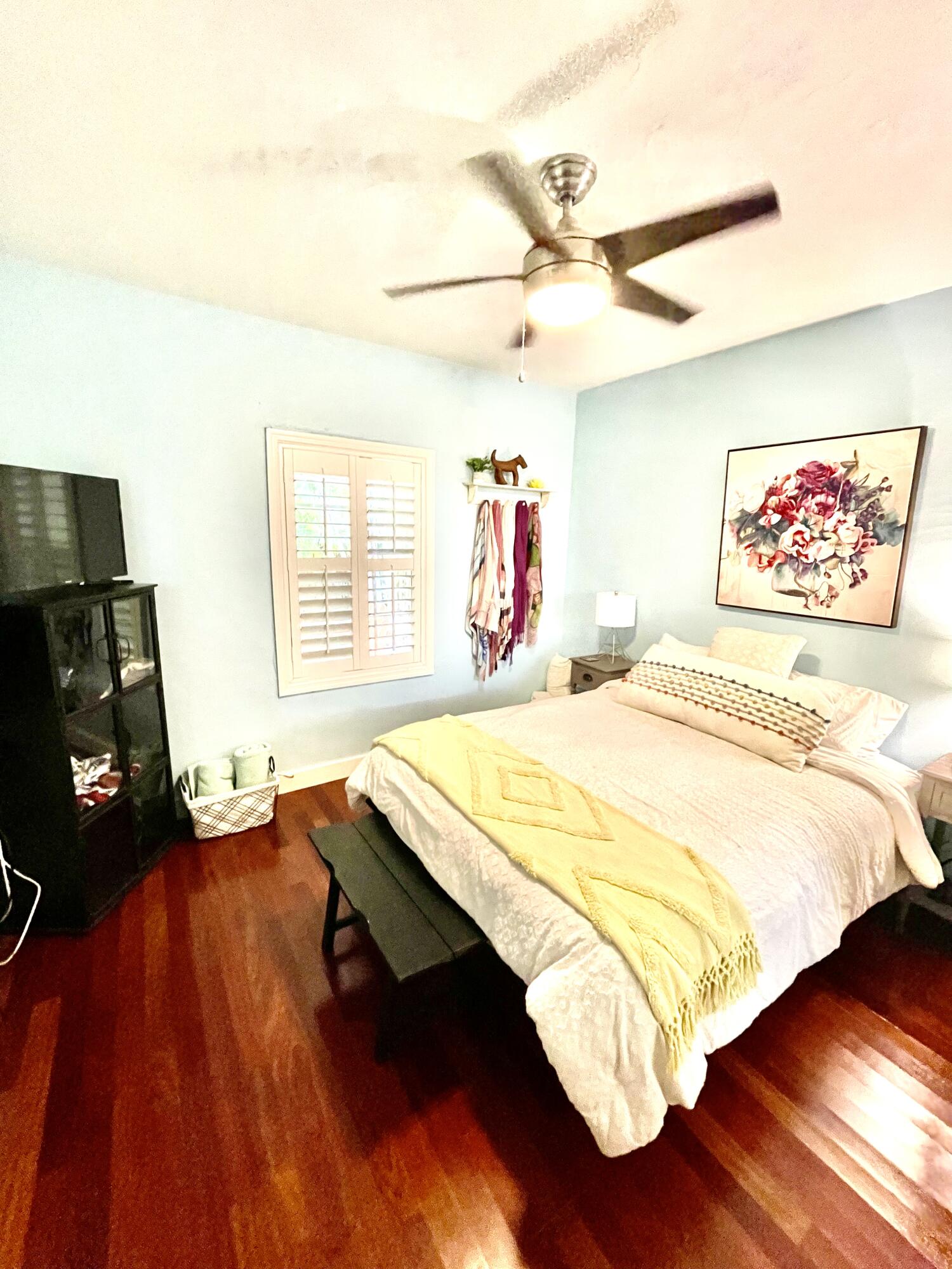 804 South Street, Unit 1 Key West, FL 33040 - Photo 25 of 31 a bed sitting in a bedroom next to a window