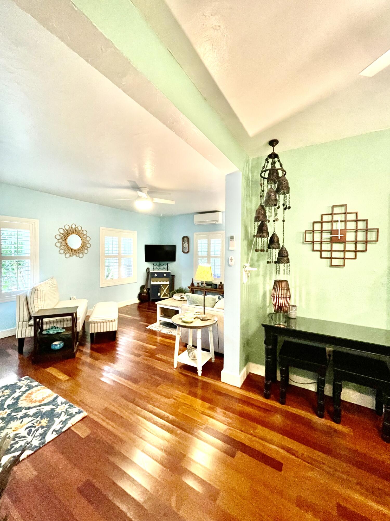 804 South Street, Unit 1 Key West, FL 33040 - Photo 9 of 31 a living room with furniture a wooden floor and next to a window