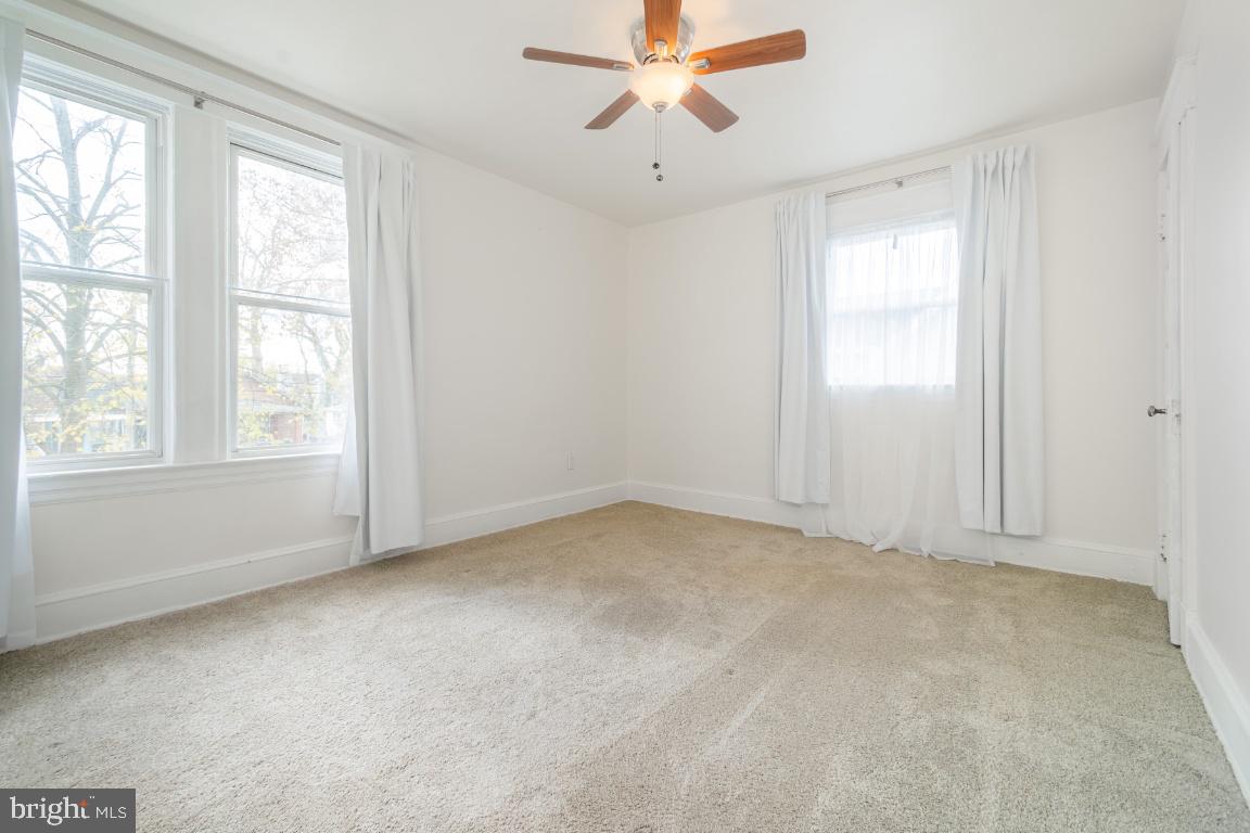 3312 Glen Avenue Baltimore, MD 21215 - Photo 15 of 25 a view of an empty room with a window