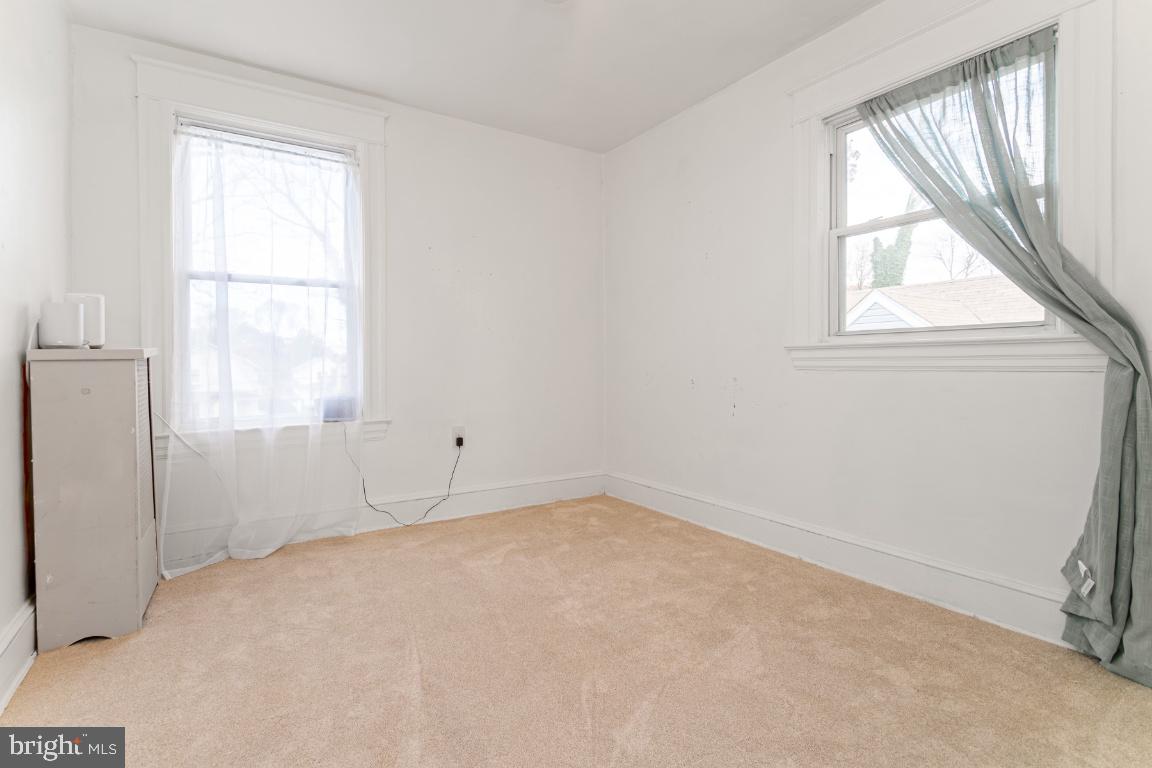 3312 Glen Avenue Baltimore, MD 21215 - Photo 20 of 25 an empty room with a window
