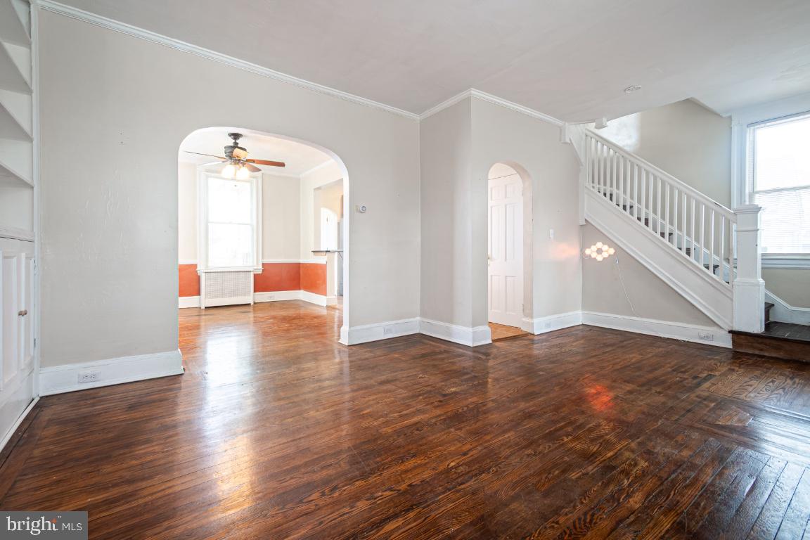 3312 Glen Avenue Baltimore, MD 21215 - Photo 5 of 25 a view of empty room with wooden floor