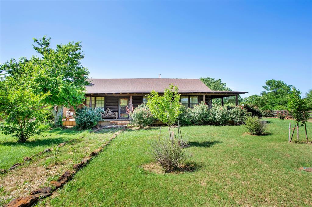 99 Calk Road Tioga, TX 76271 - Photo 20 of 20 a view of house with backyard