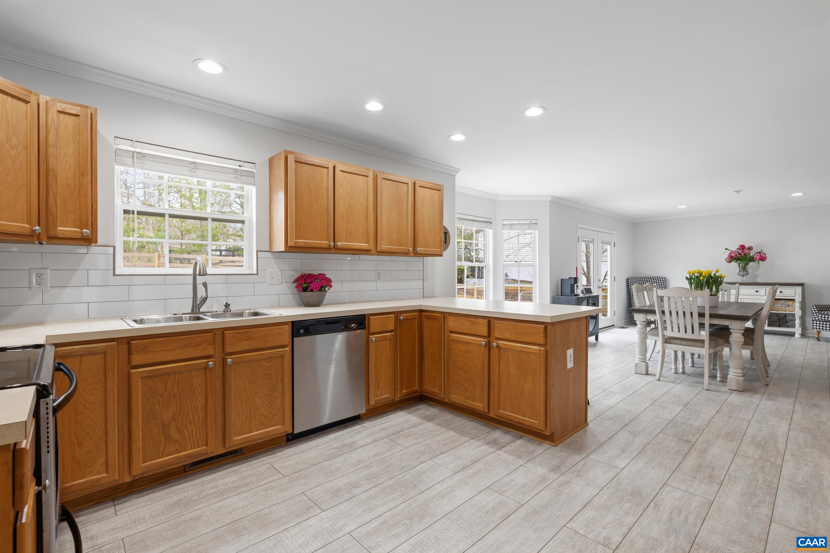 17 Hopi Way Palmyra, VA 22963 - Photo 13 of 36 a kitchen with granite countertop a sink cabinets and window