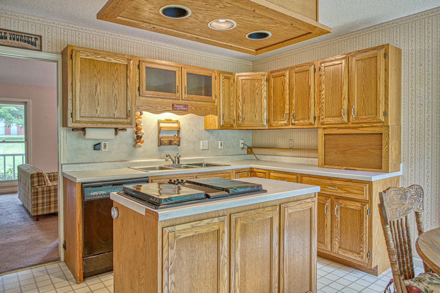 2139 Austin Bottom Road Baxter, TN 38544 - Photo 13 of 64 a kitchen with stainless steel appliances granite countertop a sink stove and cabinets