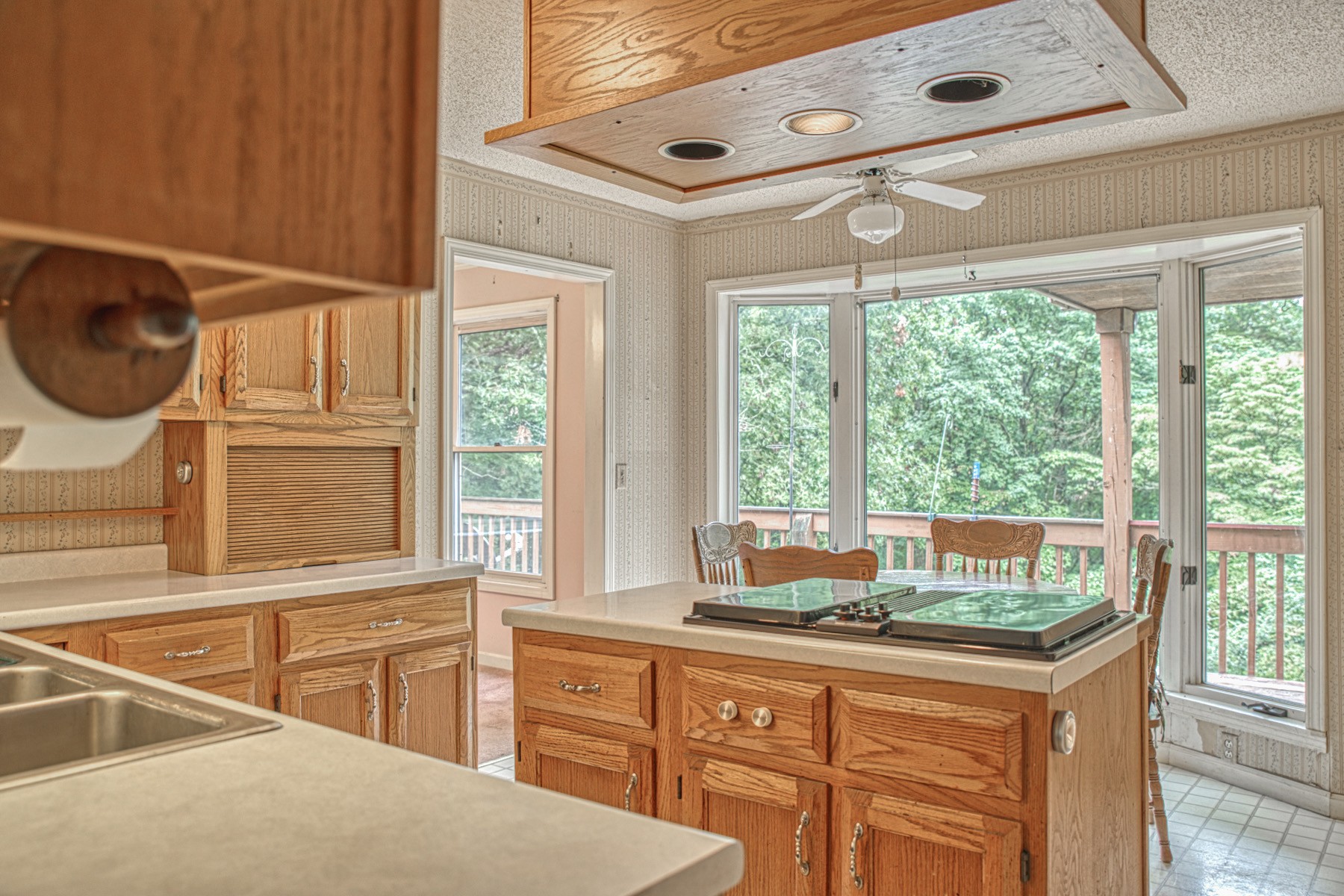2139 Austin Bottom Road Baxter, TN 38544 - Photo 14 of 64 a kitchen with a window a sink and cabinets