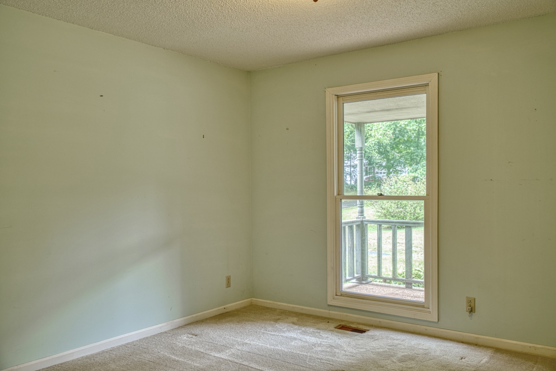 2139 Austin Bottom Road Baxter, TN 38544 - Photo 17 of 64 an empty room with wooden floor and windows