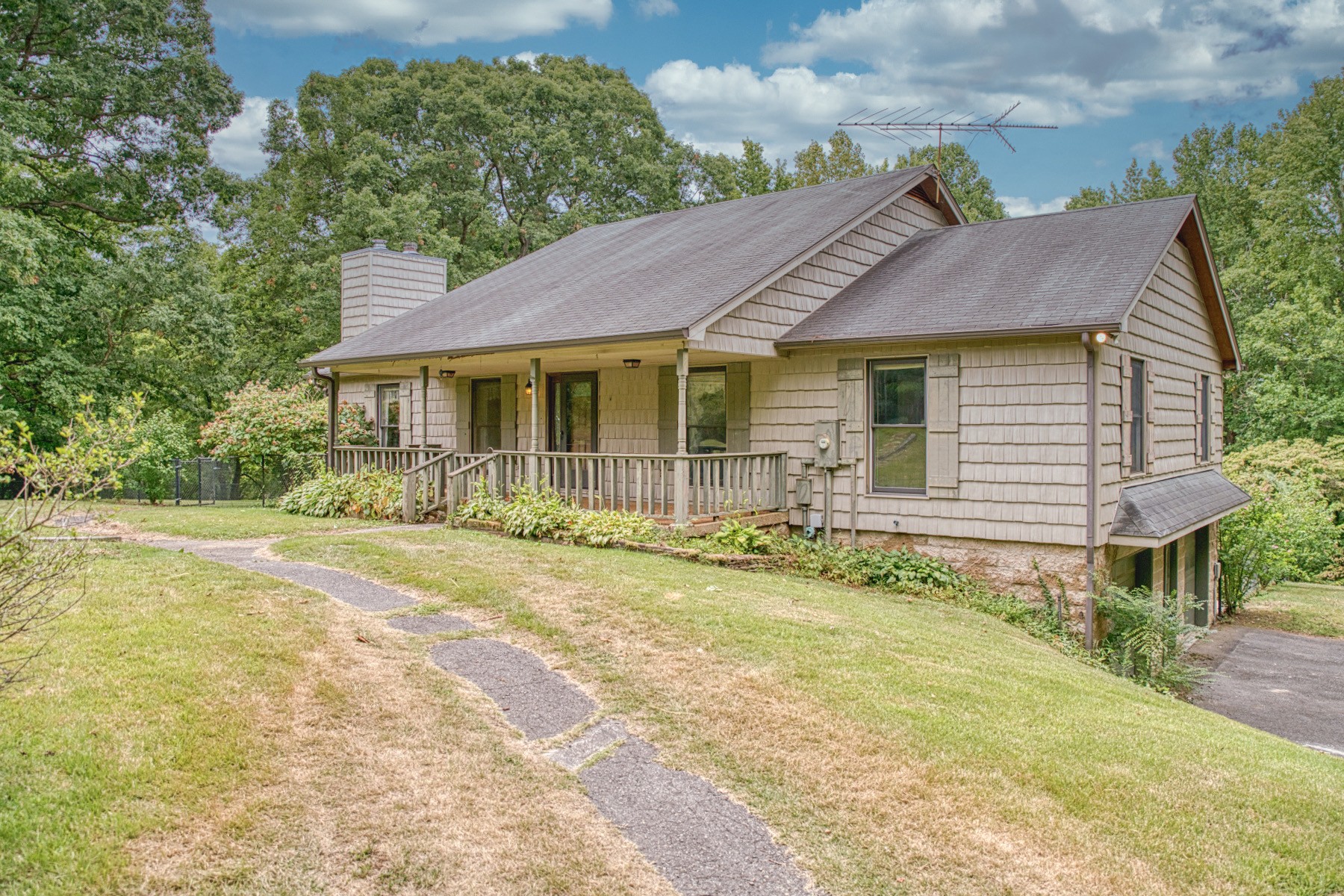 2139 Austin Bottom Road Baxter, TN 38544 - Photo 2 of 64 a front view of a house with a yard