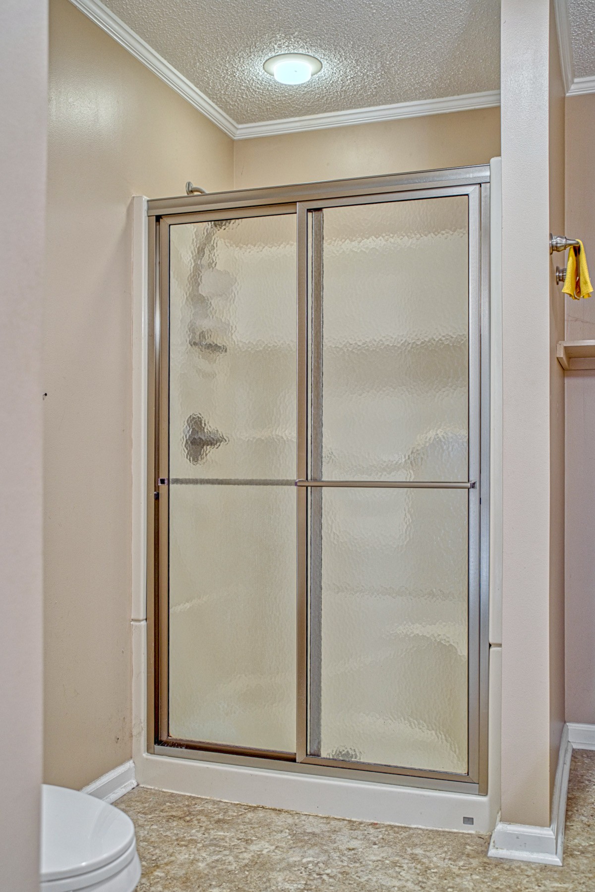 2139 Austin Bottom Road Baxter, TN 38544 - Photo 21 of 64 a bathroom with a glass shower door