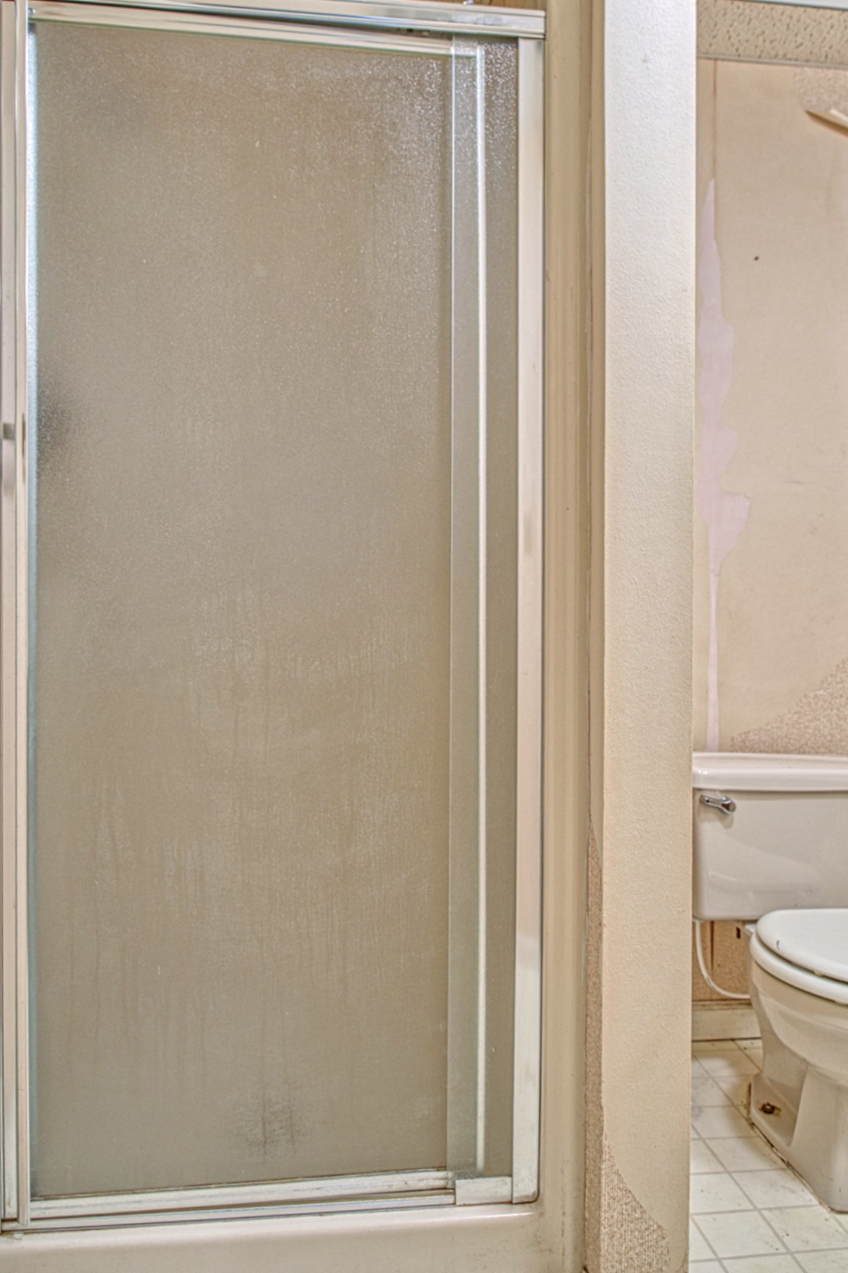 2139 Austin Bottom Road Baxter, TN 38544 - Photo 27 of 64 a bathroom with a toilet and a window