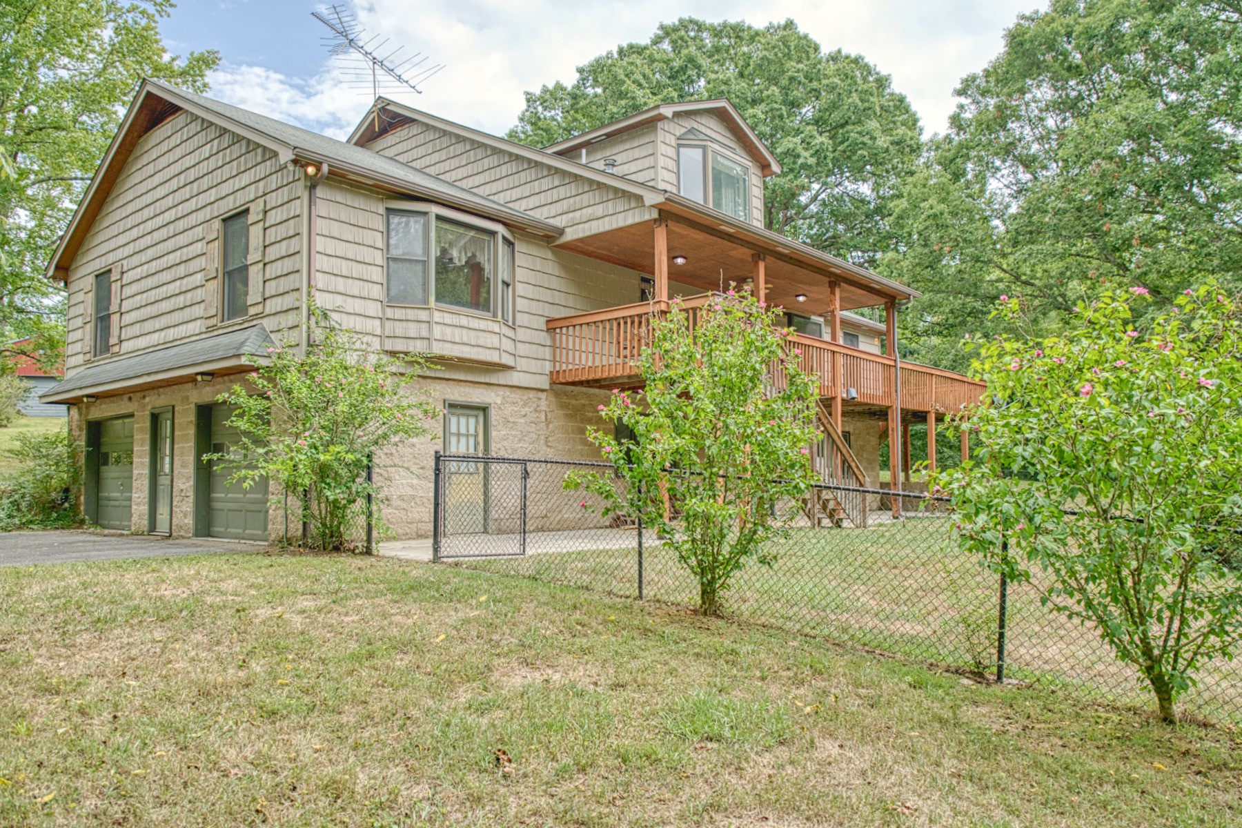 2139 Austin Bottom Road Baxter, TN 38544 - Photo 44 of 64 a front view of a house with a yard