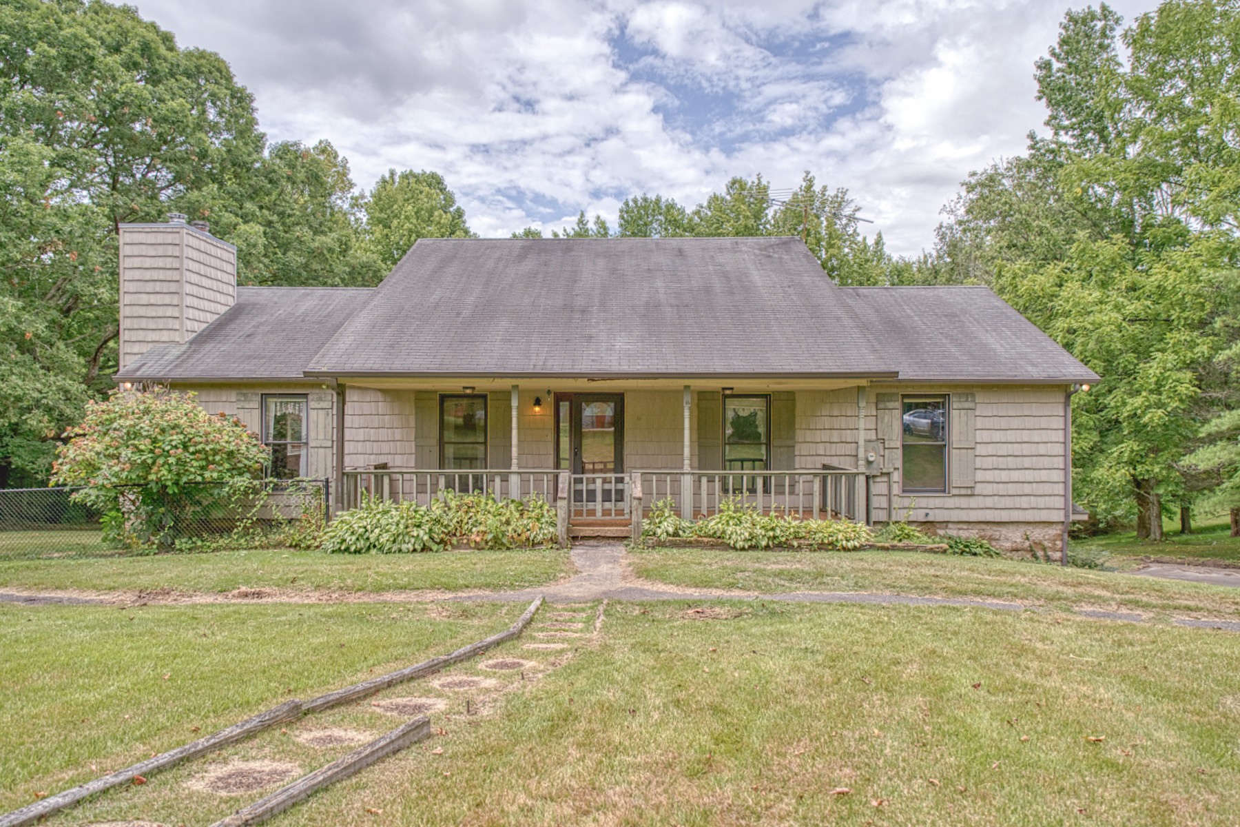 2139 Austin Bottom Road Baxter, TN 38544 - Photo 6 of 64 a front view of a house with a yard