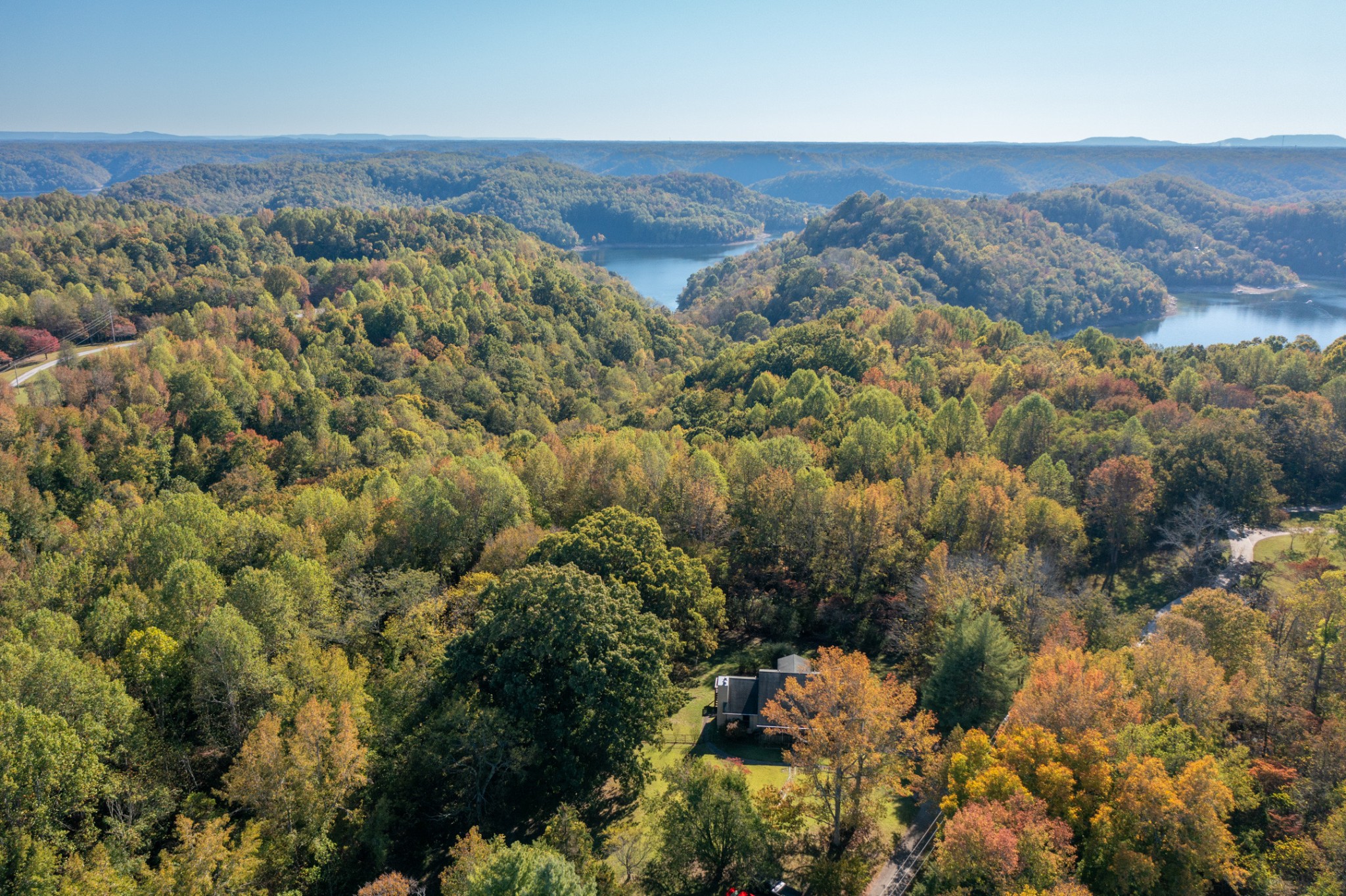 2139 Austin Bottom Road Baxter, TN 38544 - Photo 62 of 64 an aerial view of mountain with residential house and green space