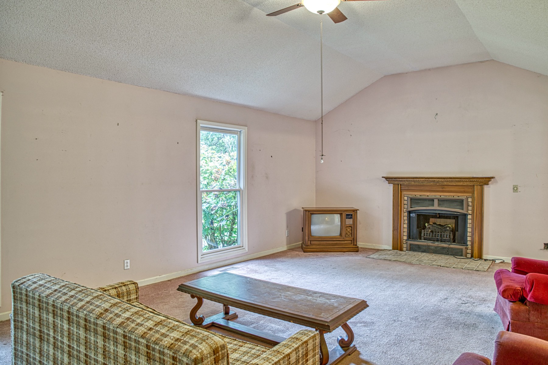 2139 Austin Bottom Road Baxter, TN 38544 - Photo 8 of 64 a living room with furniture and a fireplace