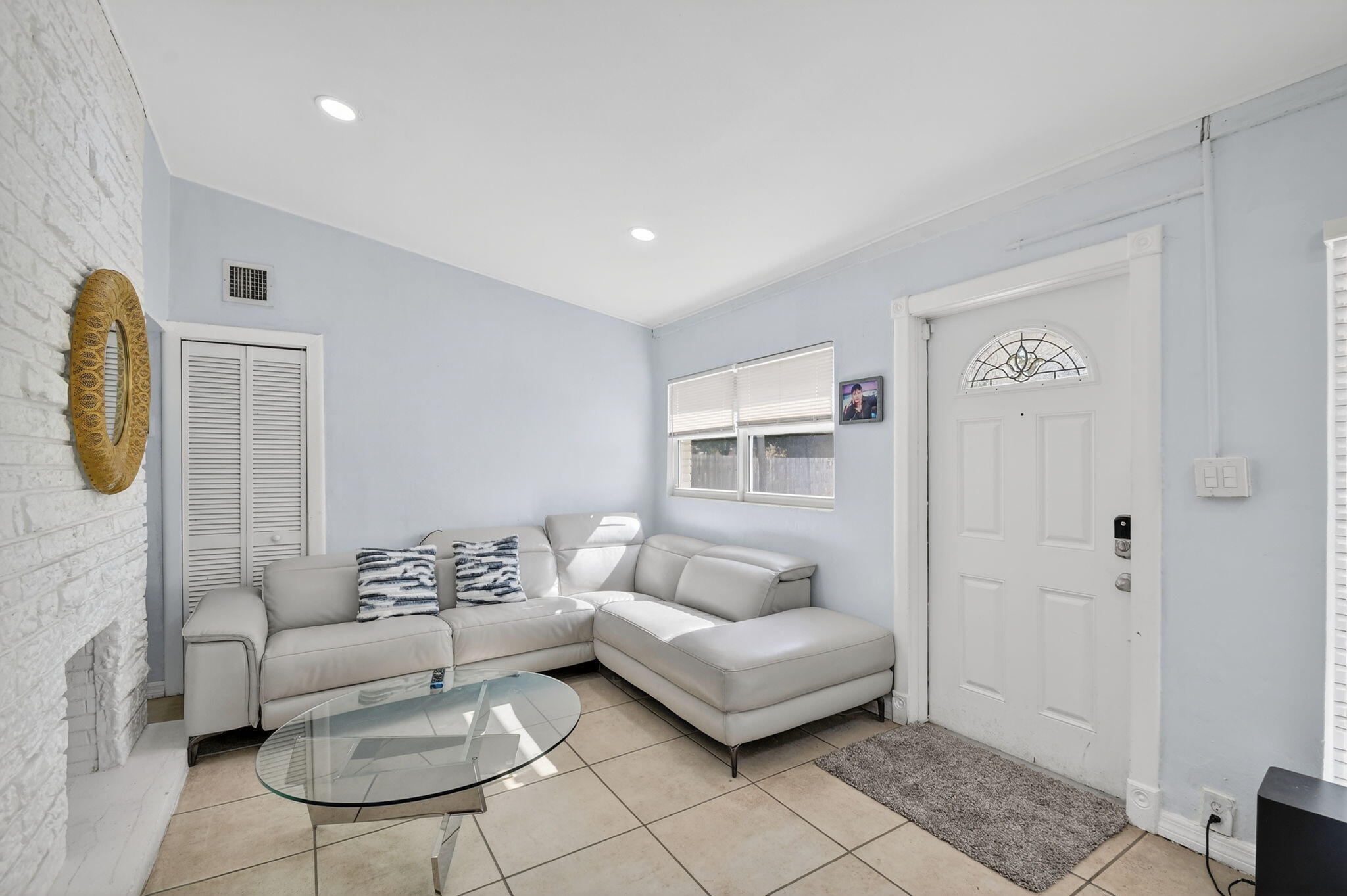 4559 Cole Street West Palm Beach, FL 33417 - Photo 12 of 72 a living room with furniture and a window