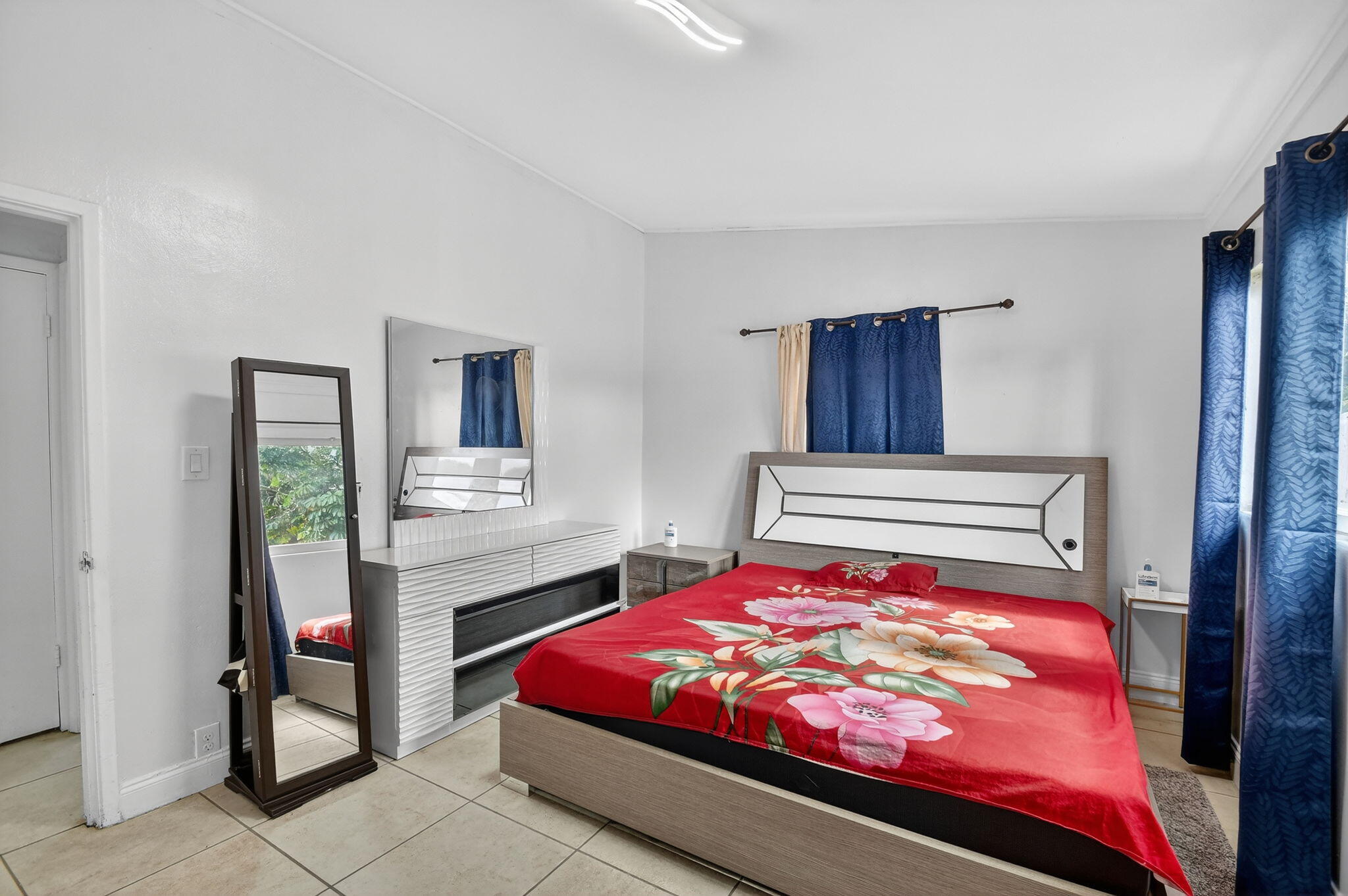 4559 Cole Street West Palm Beach, FL 33417 - Photo 27 of 72 a bedroom with a bed and a dresser