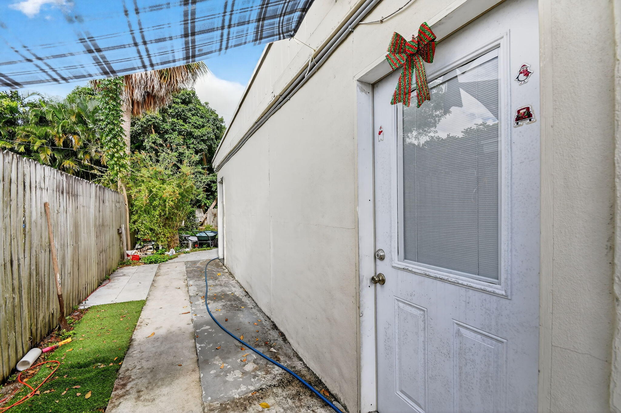 4559 Cole Street West Palm Beach, FL 33417 - Photo 29 of 72 a view of a house with a backyard