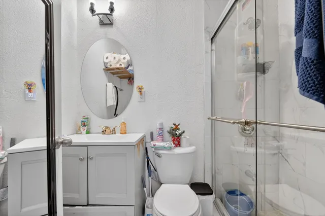 a bedroom with a bed and furniture