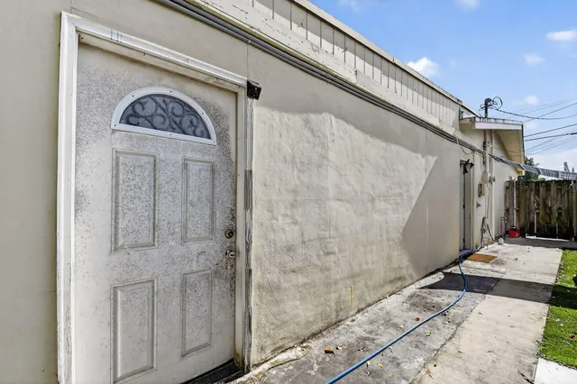a bedroom with a bed and a walk in closet
