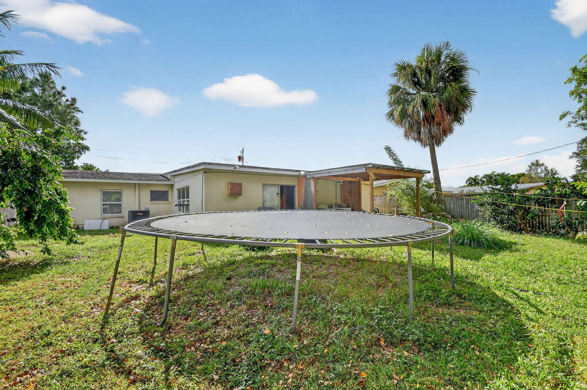 4559 Cole Street West Palm Beach, FL 33417 - Photo 57 of 72 a house view with a garden space
