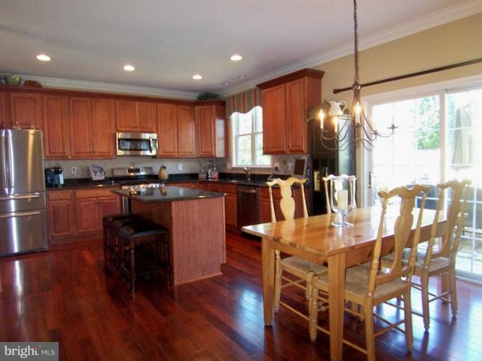 704 Longbow Road Mount Airy, MD 21771 - Photo 14 of 30 Kitchen opens to Breakfast Area