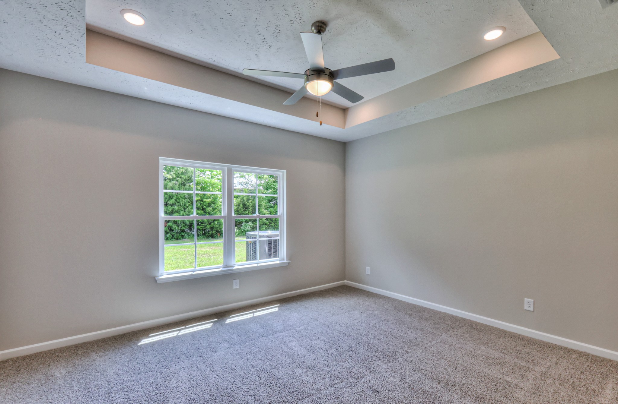 1234 North Fork Branch Road Normandy, TN 37360 - Photo 18 of 38 an empty room with a window and a ceiling fan