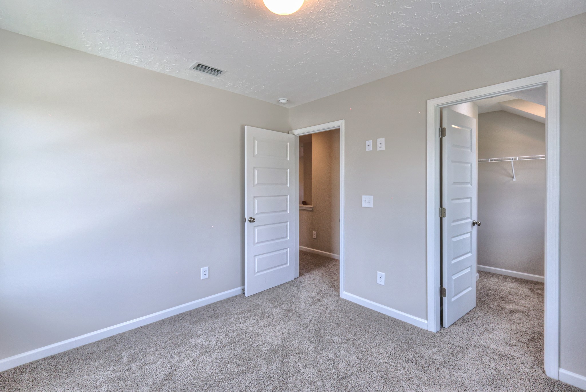 1234 North Fork Branch Road Normandy, TN 37360 - Photo 30 of 38 an empty room with closet and mirror