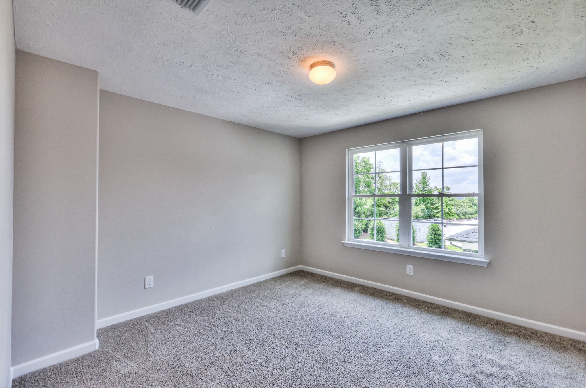 1234 North Fork Branch Road Normandy, TN 37360 - Photo 31 of 38 an empty room with a window