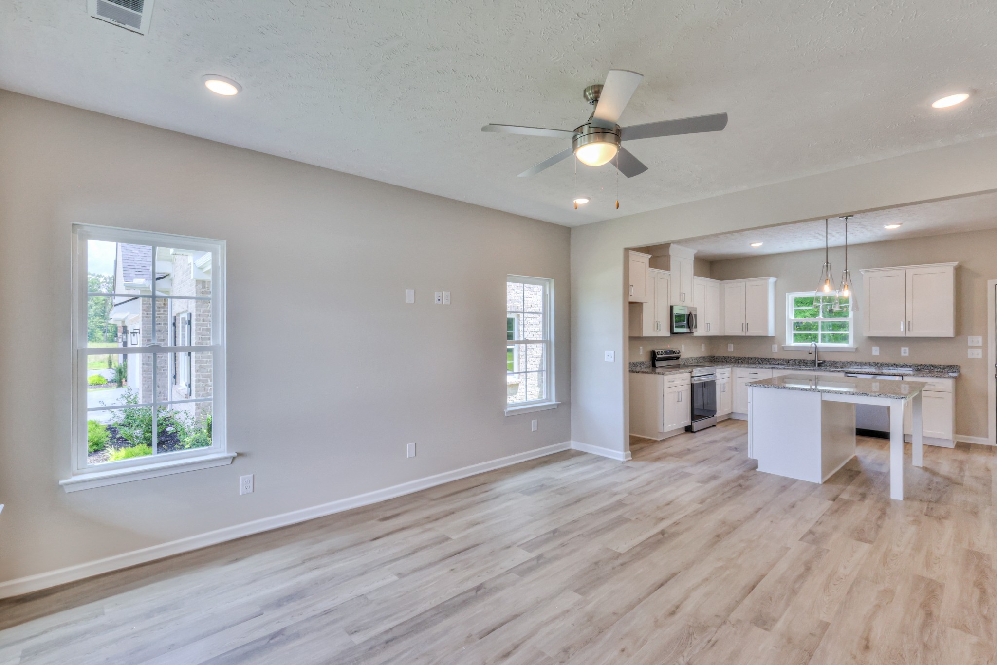 1234 North Fork Branch Road Normandy, TN 37360 - Photo 5 of 38 a view of kitchen with refrigerator microwave and wooden floor