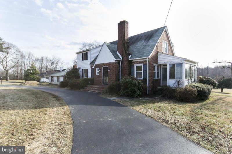 402 Whitaker Mill Road Fallston, MD 21047 - Photo 1 of 29 a front view of a house with garden