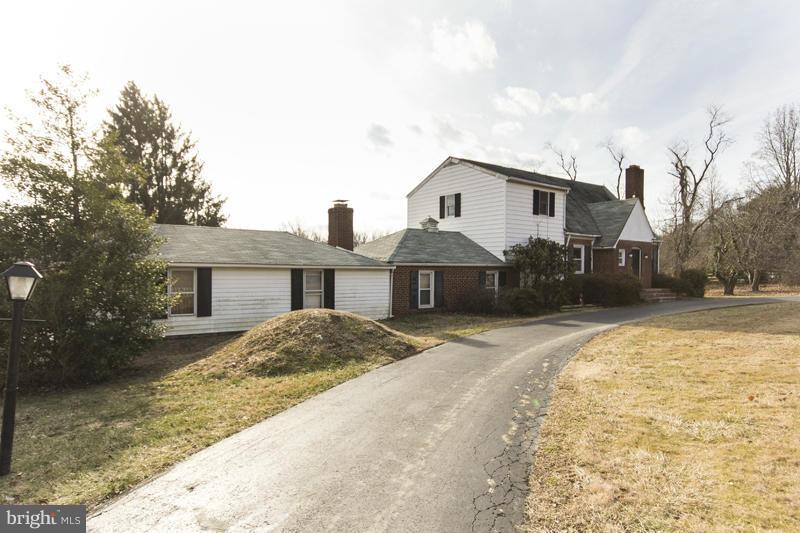 402 Whitaker Mill Road Fallston, MD 21047 - Photo 2 of 29 a front view of a house with a yard