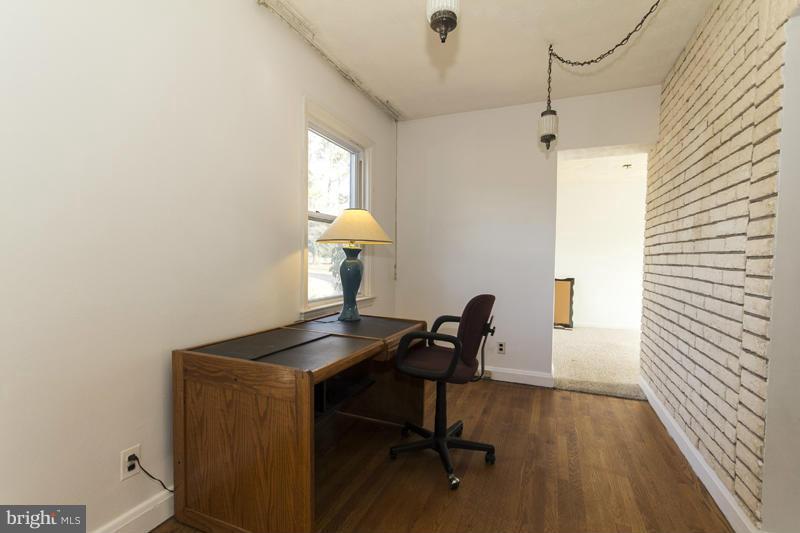 402 Whitaker Mill Road Fallston, MD 21047 - Photo 12 of 29 a view of a workspace with furniture and a window