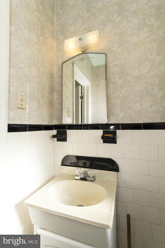 402 Whitaker Mill Road Fallston, MD 21047 - Photo 13 of 29 a bathroom with a sink and a mirror