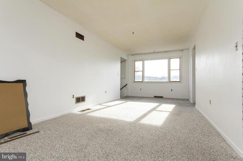 402 Whitaker Mill Road Fallston, MD 21047 - Photo 14 of 29 an empty room with a empty space and windows