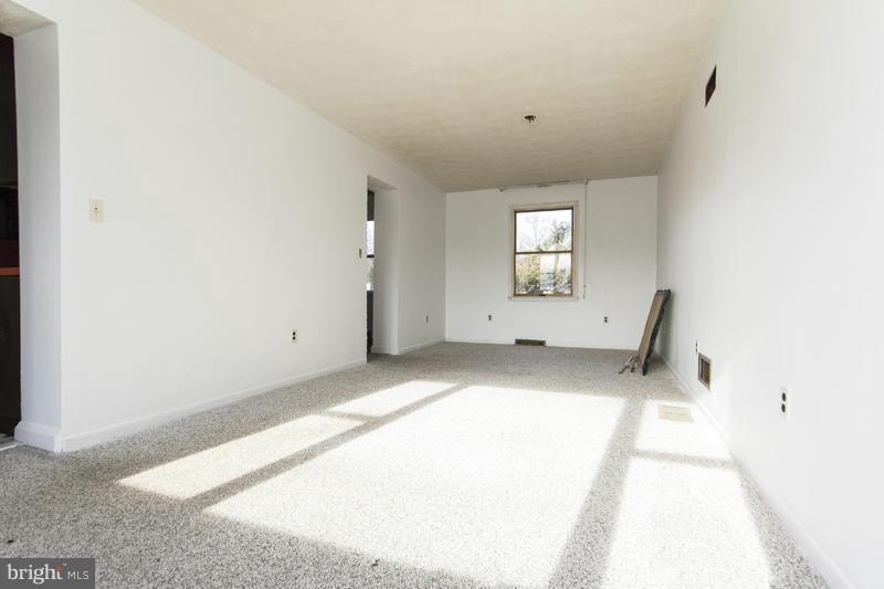 402 Whitaker Mill Road Fallston, MD 21047 - Photo 15 of 29 a view of a big room with windows