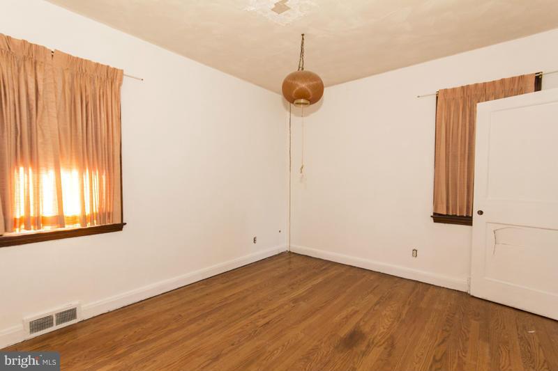 402 Whitaker Mill Road Fallston, MD 21047 - Photo 18 of 29 a view of a room with wooden floor and a window