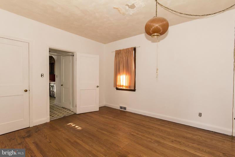 402 Whitaker Mill Road Fallston, MD 21047 - Photo 19 of 29 a view of empty room with wooden floor