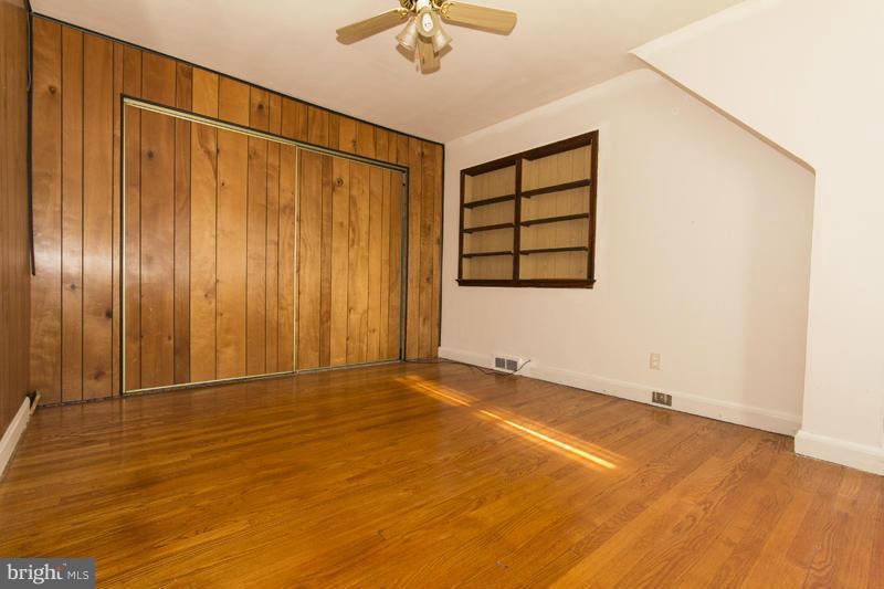 402 Whitaker Mill Road Fallston, MD 21047 - Photo 21 of 29 a view of an empty room with a ceiling fan and window